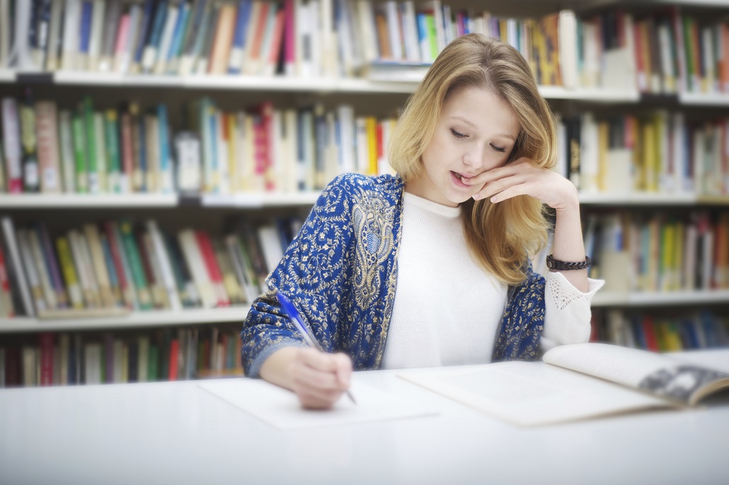 A student filling out a financial aid form