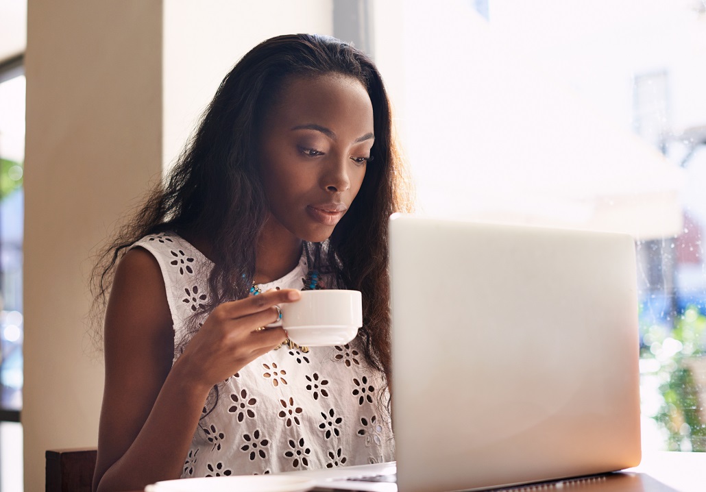 Woman using computer to learn about the FAFSA